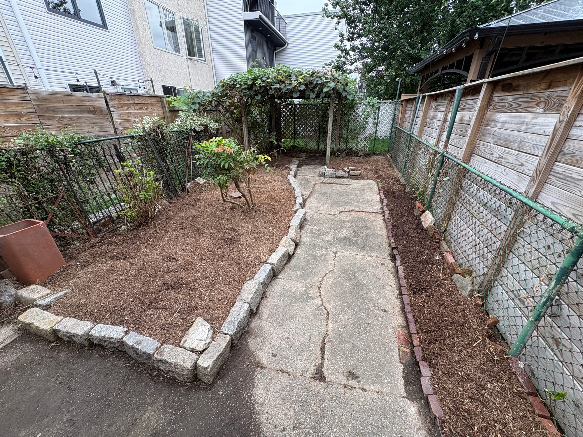 Backyard and walkway after the garden refresh